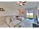 Comfortable living room with sliding glass doors leading to outdoor space at 1792 Yellow Trl, Lakeland, FL 33801