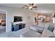 Bright living room boasts an open floor plan and a stylish sectional sofa with plush pillows at 1792 Yellow Trl, Lakeland, FL 33801
