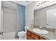 Clean bathroom featuring a single sink vanity, toilet, and shower-tub combo at 15213 Sw 14Th Avenue Rd, Ocala, FL 34473