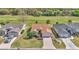 Beautiful single-story home with an attached garage, lawn and landscaping at 15213 Sw 14Th Avenue Rd, Ocala, FL 34473