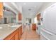 Functional kitchen featuring wooden cabinets, modern appliances, and ample counter space at 15213 Sw 14Th Avenue Rd, Ocala, FL 34473