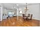 Spacious living and dining area featuring hardwood floors and abundant natural light at 15213 Sw 14Th Avenue Rd, Ocala, FL 34473
