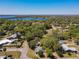 Spacious lots and mature trees abound in this neighborhood with views of a large lake in the distance at 218 W Magnolia St, Clermont, FL 34711