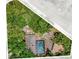 An aerial view showcases the pool, home and storage shed at 31632 Spruce Dr, Eustis, FL 32736