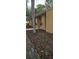 This home features a well-maintained exterior with fresh mulch and tasteful landscaping at 31632 Spruce Dr, Eustis, FL 32736