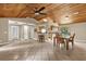 Open floor plan showcases the spacious living area, dining space, and kitchen at 31632 Spruce Dr, Eustis, FL 32736