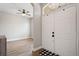 Bright entryway with double doors, tile flooring, and views into the adjacent living spaces at 32421 Wolfs Trl, Sorrento, FL 32776