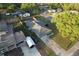 An aerial view of home with long driveway, and fenced-in yard at 3247 S Polk Ave, Lakeland, FL 33803