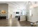Inviting living room featuring modern lighting, hard surface floors, and ample space at 5416 Oxford Manor Cir, Lakeland, FL 33810