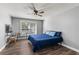 Bedroom with wood-look floors, a ceiling fan and natural light at 638 Coral Way, Winter Springs, FL 32708