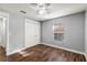 Bedroom with wood-look floors, a ceiling fan and natural light at 638 Coral Way, Winter Springs, FL 32708