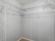 Spacious walk-in closet with plenty of shelving for storage at 638 Coral Way, Winter Springs, FL 32708