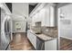 Bright kitchen showcasing granite counters, stainless appliances and an open floorplan at 638 Coral Way, Winter Springs, FL 32708