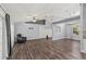 Large living room with wood floors, ceiling fans, and plenty of space for entertaining at 638 Coral Way, Winter Springs, FL 32708