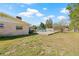 Extensive backyard featuring an above-ground pool, covered patio, and plenty of space for activities at 4305 Hamilton Rd, Lakeland, FL 33811