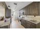 Kitchen with plenty of counter space, mosaic tile backsplash and stainless steel appliances at 4305 Hamilton Rd, Lakeland, FL 33811
