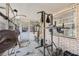 Workout room featuring gym equipment, concrete floors, and a large window providing light and air at 4305 Hamilton Rd, Lakeland, FL 33811