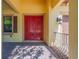 Close-up of the inviting red double front door, showcasing the architecture and design at 8427 Prestbury Dr, Orlando, FL 32832