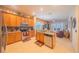 Modern kitchen with stainless steel appliances and granite countertops, open to the living area for easy entertaining at 8427 Prestbury Dr, Orlando, FL 32832