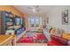 Bright living room with French doors to the outside, modern decor, and a cozy seating area at 8427 Prestbury Dr, Orlando, FL 32832