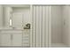 Clean bathroom with tiled shower, white vanity, and ample space at 1157 Hour Glass Rd, Lakeland, FL 33801