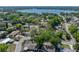 Overhead shot of the neighborhood with mature trees surrounding the property and adjacent homes at 501 15Th Ne Ct, Winter Haven, FL 33881