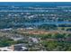 Scenic aerial view showcasing the baseball park, lake, and beautiful views of the surrounding community at 501 15Th Ne Ct, Winter Haven, FL 33881