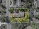 Birds eye view of the property outlined within a maturely landscaped and desirable neighborhood at 501 15Th Ne Ct, Winter Haven, FL 33881