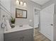 Bathroom featuring a modern vanity, framed mirror, and neutral paint at 501 15Th Ne Ct, Winter Haven, FL 33881