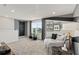 Cozy bonus room, perfect for relaxing and entertaining, featuring stylish decor and natural light at 1423 Hamilton Way, Lake Alfred, FL 33850