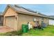 Exterior shot of the home with solar panels, tidy landscaping and a fenced yard for outdoor activities at 3035 Buckeye Pointe Dr, Winter Haven, FL 33881