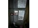 Close-up of the Rheem HVAC unit with detailed informational stickers and labels, ensuring efficient climate control at 3035 Buckeye Pointe Dr, Winter Haven, FL 33881