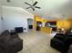 Spacious open-concept layout with living area, kitchen, and dining area, perfect for Gathering gatherings at 3035 Buckeye Pointe Dr, Winter Haven, FL 33881