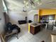 Open floor plan showcasing a living area, kitchen, and dining area, ideal for entertaining at 3035 Buckeye Pointe Dr, Winter Haven, FL 33881
