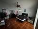 Main bedroom offers ample space, ceiling fan, and a large window providing an abundance of natural light at 3035 Buckeye Pointe Dr, Winter Haven, FL 33881