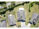 Aerial view of a single-story house showcasing the roofline and backyard at 6898 Sw 95Th Cir, Ocala, FL 34481