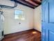 Utility room with white cinderblock walls and a blue door at 156 Plumosus Dr, Altamonte Springs, FL 32701