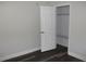 This bedroom has sleek, modern flooring and a spacious closet for storage at 3821 Whitedove Dr, Lakeland, FL 33812