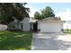 Charming one-story home with attached garage and front yard at 3821 Whitedove Dr, Lakeland, FL 33812