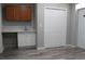 Mud room with cabinets, sink, and bi-fold doors to a closet at 3821 Whitedove Dr, Lakeland, FL 33812