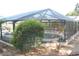 Screened pool with new plantings and landscaping at 3821 Whitedove Dr, Lakeland, FL 33812