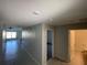 Hallway featuring tile flooring and doorways leading to various rooms at 4516 Casablanca Ave, Kissimmee, FL 34746