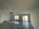 Spacious living room featuring tile flooring, recessed lighting, and lots of natural light at 4516 Casablanca Ave, Kissimmee, FL 34746