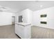 Bright living space featuring hard wood floors, a ceiling fan, backyard access, and ample natural light at 13276 Tula Loop, Astatula, FL 34705