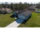 Aerial view of a charming single-Gathering home with an attached two-car garage at 2840 Sw 166 Th Ln, Ocala, FL 34473
