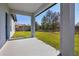 Covered back porch overlooking the spacious backyard at 2840 Sw 166 Th Ln, Ocala, FL 34473