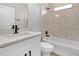Bathroom featuring a quartz vanity, tub, and tiled shower at 2840 Sw 166 Th Ln, Ocala, FL 34473