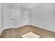 An airy bedroom featuring modern wood flooring and neutral paint at 2840 Sw 166 Th Ln, Ocala, FL 34473