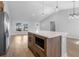 Bright living space with an island, stainless appliances, wood floors and lots of natural light at 2840 Sw 166 Th Ln, Ocala, FL 34473