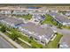 An aerial view showcases a meticulously planned community with well-manicured lawns at 3926 Grassland Dr, Orlando, FL 32824